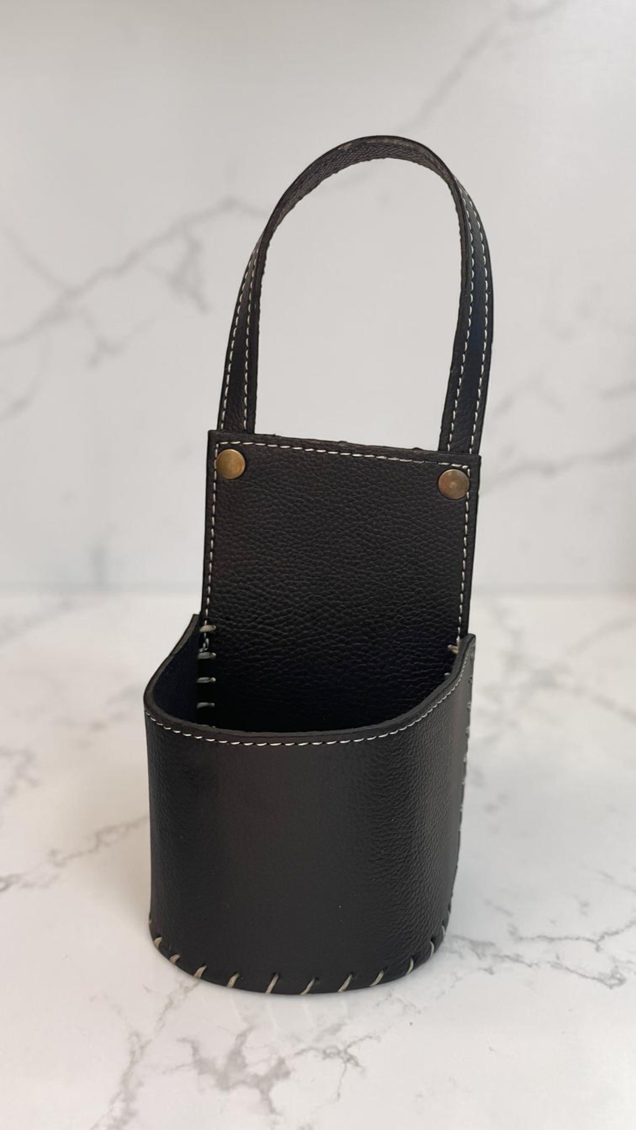 Portamate cuerina